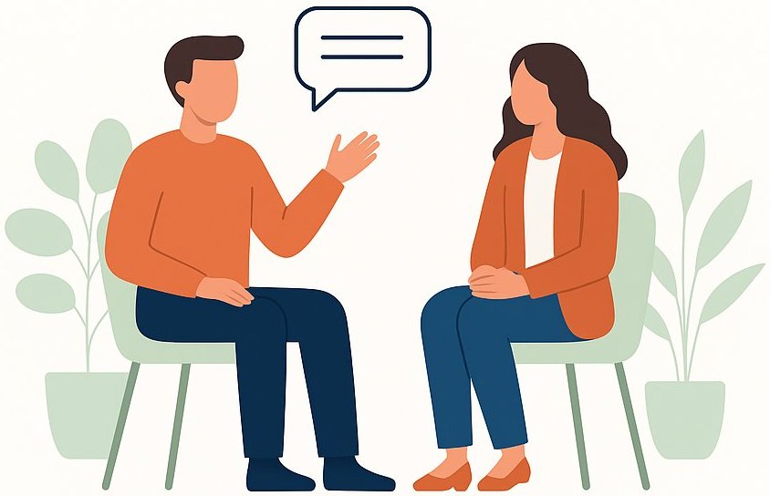 Sessione di coaching tra coach e cliente durante un colloquio di orientamento professionale per diventare coach certificato