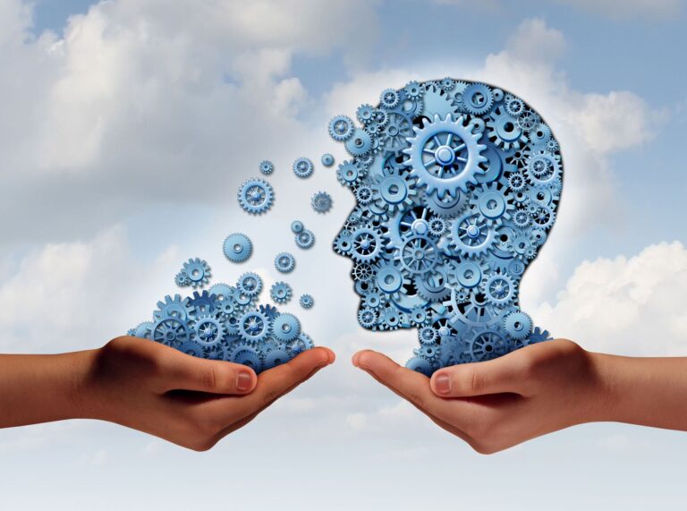 Illustrazione con testa composta da ingranaggi blu che rappresentano il legame tra neuroscienze e coaching, simbolo di consapevolezza, cambiamento e risultati duraturi nei percorsi di crescita personale